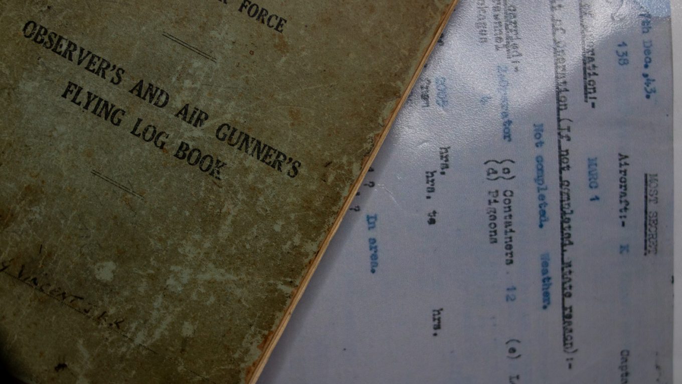 Flying log book cover for JKR Vincent and Operation report and Operation Marc 1