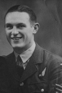 F Sgt J K R Vincent April 1944 smiling in uniform showing Air Gunners wing