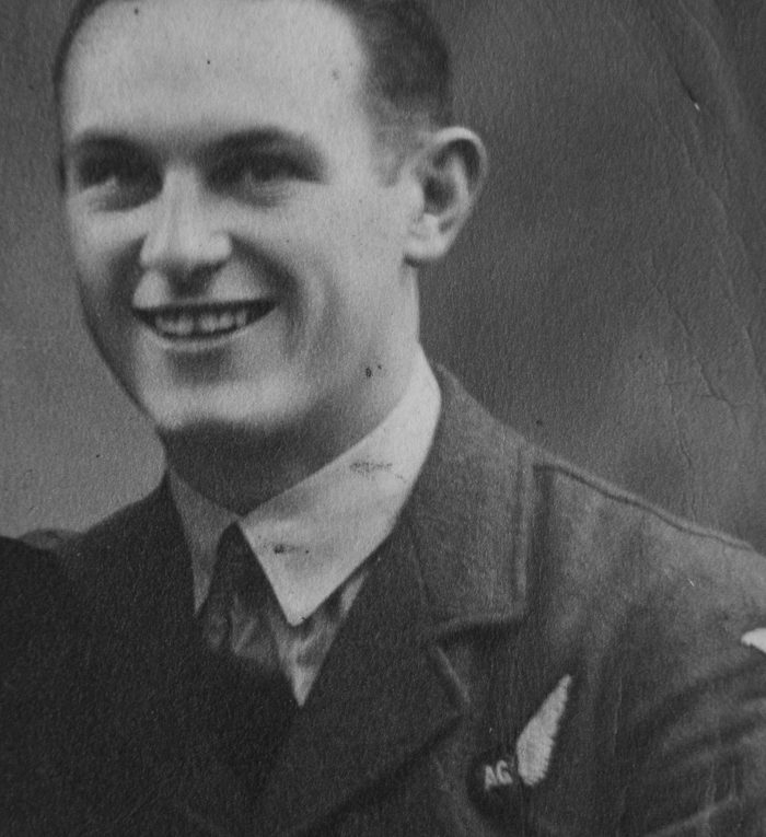 F Sgt J K R Vincent April 1944 smiling in uniform showing Air Gunners wing